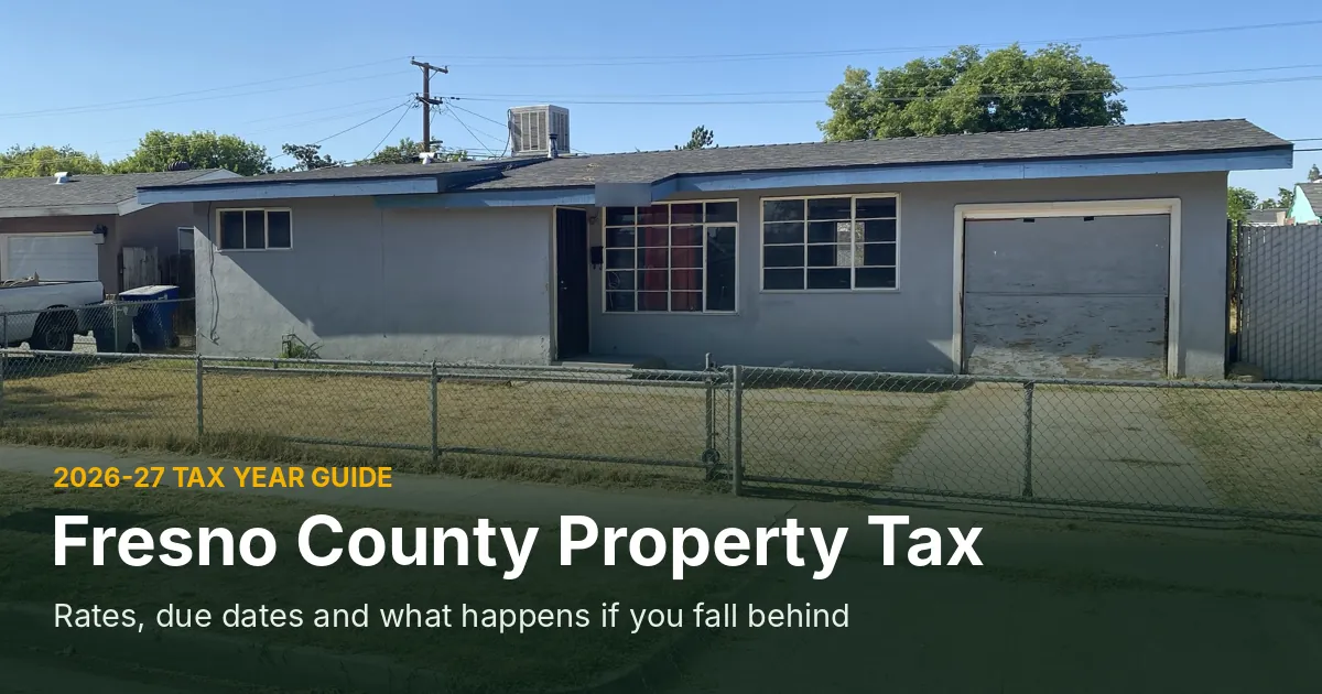 Single-story gray stucco house behind a chain-link fence in a Fresno neighborhood, cover photo for a guide to Fresno County property tax