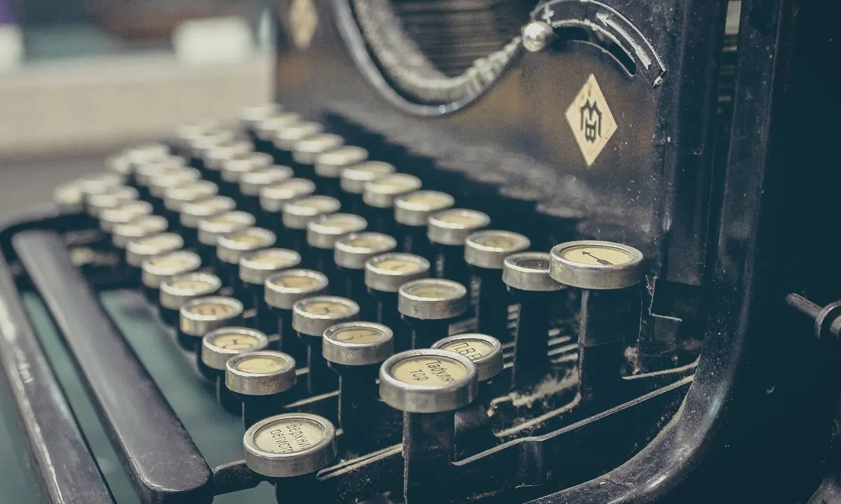 Close-up of the round keys of an old black typewriter